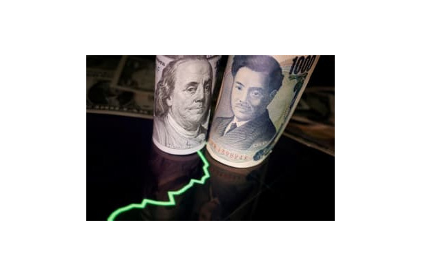 円とドルの紙幣（ロイター＝共同）